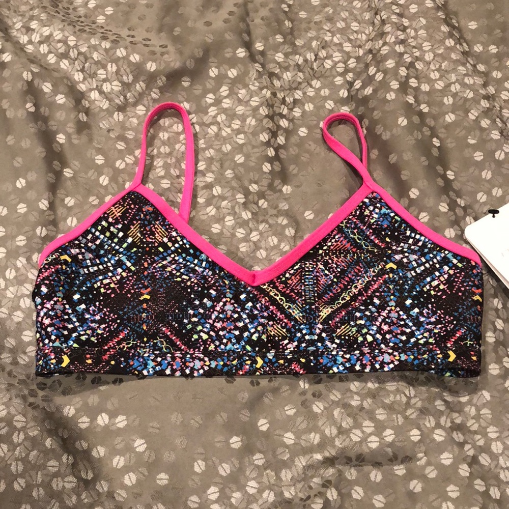 Dolphins swim top